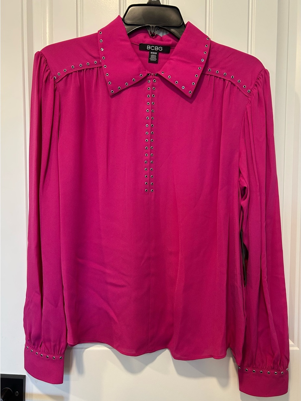 NWT pink BCBG dress shirt with metal details. Perfect office blouse.